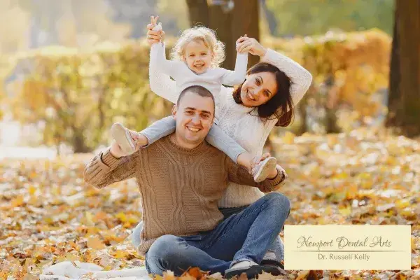 Family enjoying an autumn day in Newport Beach near Newport Dental Arts.