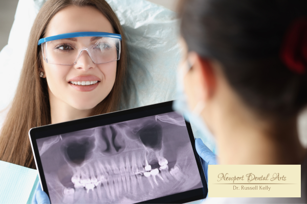 Newport Beach patient reviewing digital smile design preview at Newport Dental Arts